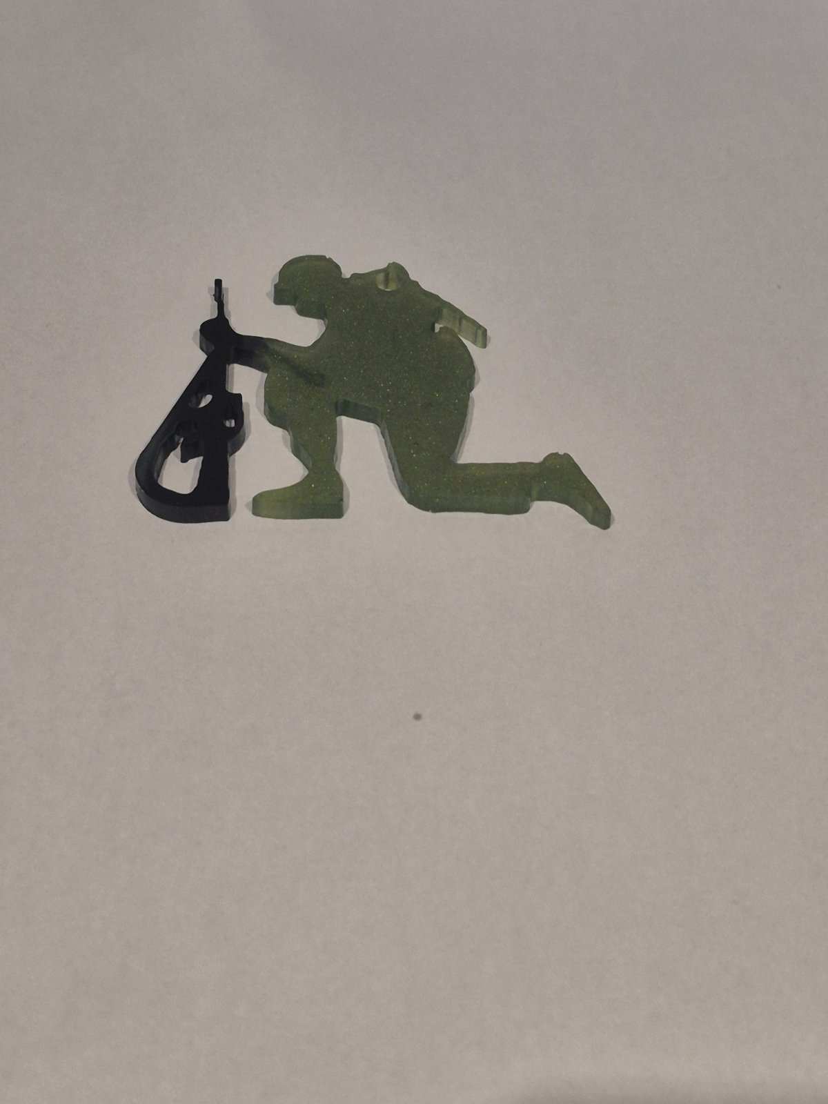 Soldiers with gun or saluting