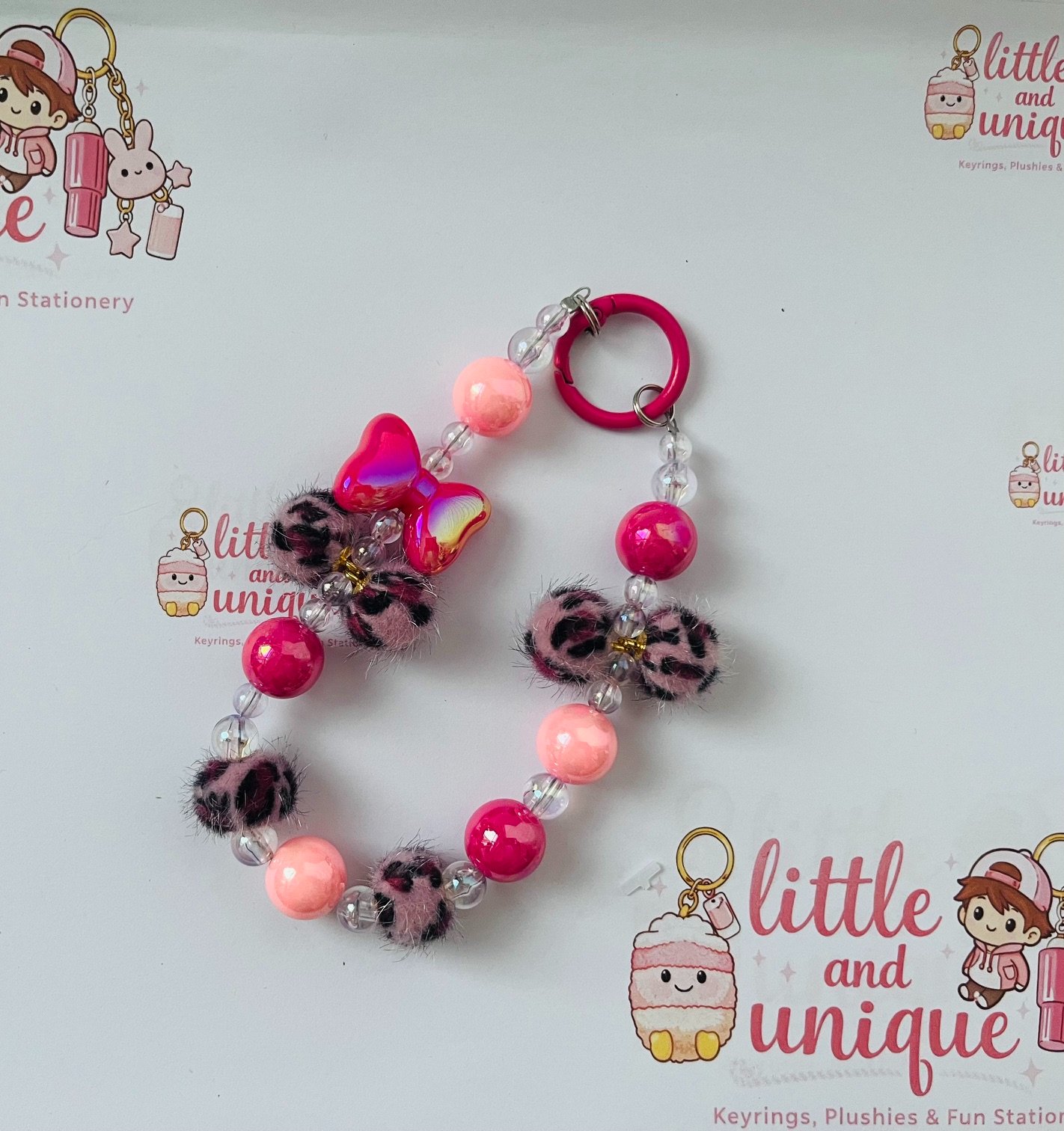 Leopard Pom‑Pom Bow Keyring